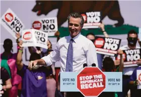  ?? Carolyn Kaster / Associated Press ?? Gov. Gavin Newsom arrives to speak at a recall election rally in San Leandro on Wednesday. A suit seeking an injunction on the recall election has been rejected by a federal court.