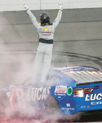  ?? JAE C. HONG/AP ?? Two-time NASCAR Cup champion Kyle Busch celebrates after winning Sunday’s race in Fontana, California.