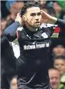  ?? SNS. ?? Paul Hartley, top, is keen to emulate Rangers and negate Celtic’s strengths; Faissal El Bakhtaoui almost grabbed a late equaliser for Dundee in their last game against Celtic.