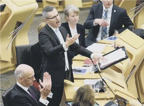  ?? PICTURE:PA ?? Derek Mackay announces his decision to increase the Scottish rate of income tax in the Budget