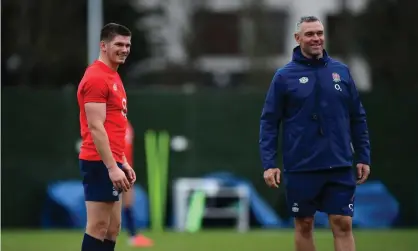  ??  ?? Jason Ryles (right), who has introduced tactics from rugby league into England’s gameplan, shares a moment with Owen Farrell, whose dad Andy began his career in league. Photograph: Dan Mullan/RFU/Getty Images