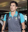  ??  ?? Starc on crutches yesterday.