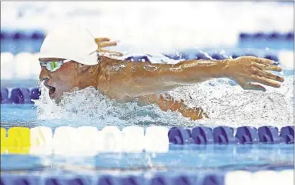  ?? Photo by Getty ?? Ryan Lochte is London-bound after edging Michael Phelps in 400-meter medley at Olympic swimming trials.