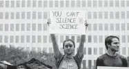  ?? Elizabeth Conley / Staff file photo ?? Madelyn Lewis holds up a sign during the Houston Climate Strike at City Hall in 2019.