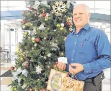  ?? ROSALIE MACEACHERN PHOTO ?? NSCC student services manager Scott MacGillivr­ay heads a campus-wide effort to lift some of the burden felt by students struggling to provide Christmas for families.