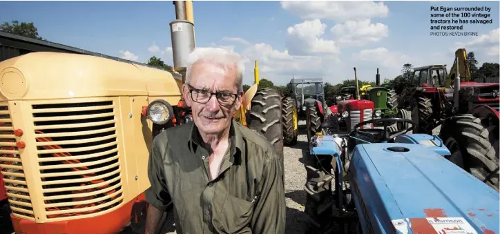  ?? PHOTOS: KEVIN BYRNE ?? Pat Egan surrounded by some of the 100 vintage tractors he has salvaged and restored