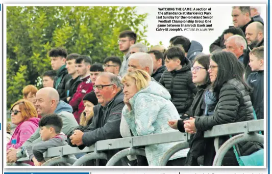  ?? PICTURE BY ALAN FINN ?? WATCHING THE GAME: A section of the attendance at Markievicz Park last Sunday for the Homeland Senior Football Championsh­ip Group One game between Shamrock Gaels and Calry-St Joseph’s.