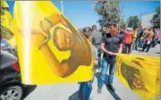  ?? AFP ?? Protestors with flags bearing pictures of Marwan Barghouti