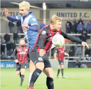  ?? Chelsie Wilson ?? Elliott Durrell competes in an aerial duel at Hartlepool