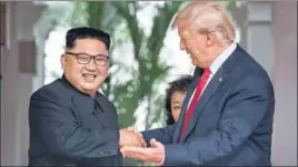  ?? AP ?? ■ US President Donald Trump with North Korea leader Kim Jong Un at the Capella resort on Sentosa Island in Singapore on Tuesday.