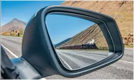  ??  ?? Ï A time to reflect
They say that photograph­y mirrors your personalit­y! On reflection, this was the case in Scotland on May 3, 2017. I photograph­ed Peppercorn K1 2-6-0
No. 62005 en route for Fort William, working the ‘Great Britain X’ excursion. Putting my creative hat on, I decided to stay in the car at County March Summit and photograph the train in my vehicle’s wing mirror. There is a knack to getting an image sharp in a mirror: the further you are away from it, the sharper the subject will be and this time I used a wide angle. You can see that a lorry is just about to enter the mirror, I was so lucky that my view wasn’t blocked at the moment I pressed the shutter.
Nikon D5 with Nikon 24-70mm F2.8 lens. 1/400th sec at f10 on ISO250