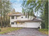  ?? SHANNON DRUMMOND ?? This Maple Ridge detached house sits on a private treed corner lot on the most westerly part of the city and sold in just five days.