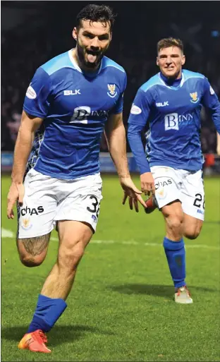  ??  ?? St Johnstone striker Tony Watt wheels away in celebratio­n after breaking the deadlock 89 minutes in