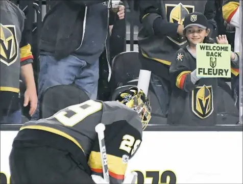  ?? Ethan Miller/Getty Images ?? A young fan had a message for Marc-Andre Fleury Tuesday night in Las Vegas as he started for the first time since October.