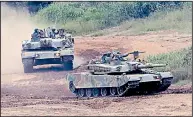  ?? AP/LEE JIN-MAN ?? South Korean tanks take part in military exercises Tuesday in Paju, near the North Korean border.