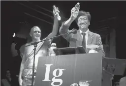  ?? ELISE AMENDOLA/AP ?? Shigeru Watanabe of Japan receives the Ig Nobel award in chemistry in 2019 for estimating the total saliva volume produced per day by a typical 5-year-old.