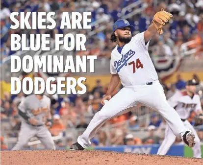  ?? STEVE MITCHELL, USA TODAY SPORTS ?? Dodgers closer Kenley Jansen is 21-for-21 in save chances, striking out 57 and walking only two in 372⁄ innings.