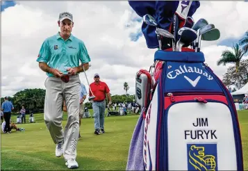  ?? PHOTOS BY RICHARD GRAULICH / THE PALM BEACH POST ?? Jim Furyk practices for the Honda Classic on Tuesday at PGA National. Furyk, the captain of the U.S. Ryder Cup team, named Tiger Woods and Steve Stricker as vice-captains.