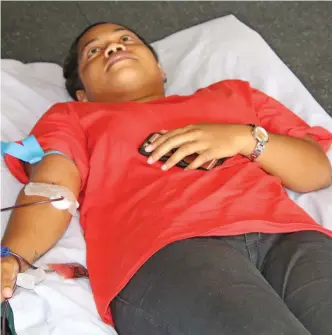  ?? Photo: Fiji National University ?? FNU student Emi Cabemaiwai donates blood during the week-long blood drive held at FNU campuses across the country