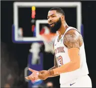  ?? Emilee Chinn / Getty Images ?? The Knicks’ Marcus Morris Sr. reacts to a call during the third quarter against the Washington Wizards.