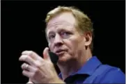  ?? ROSS D. FRANKLIN — THE ASSOCIATED PRESS FILE ?? NFL Commission­er Roger Goodell talks with Arizona Cardinals season ticket holders during a press conference earlier this summer. The league is working on a five-year contract extension for Goodell.