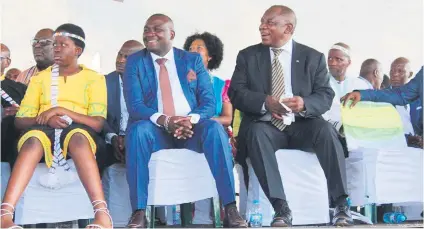  ?? Picture: Alex Matlala ?? BATTLE ERUPTS. The future rain queen, Masalanabo Modjadji, 13, with her uncle, Mpapatla Modjadji, centre, and President Cyril Ramaphosa in Bolobedu outside Tzaneen in Limpopo.