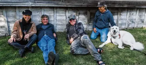  ?? JoeY MArtineZ ?? Neil Young (second from right) with (from left) Nils Lofgren, Billy Talbot, and Ralph Molina of Crazy Horse. On tour, guitarist Micah Nelson has taken Lofgren’s place.