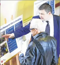  ?? Picture: Andy Jones FM4406027 ?? Matthew Black, right, talked to residents at an exhibition of plans for the Aylesford Newsprint site