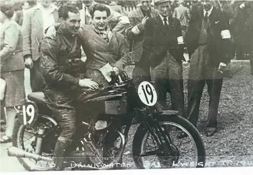  ??  ?? | JUNE 2021
Below: Ben Drinkwater poses with his Excelsior (and his wife, one assumes), after finishing third in the 1947 Lightweigh­t TT.