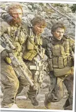  ??  ?? Brothers in arms: Ben Foster, Emile Hirsch, Mark Wahlberg