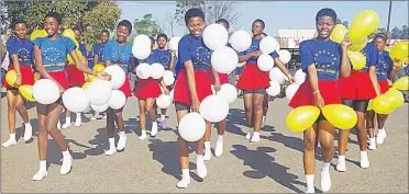  ?? ?? The pupils all smiles as they displayed creative and captivatin­g moves during the parade from Mahlanya to House On Fire.