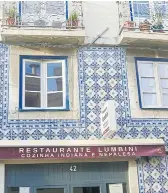  ??  ?? RIGHT
A Nepalese restaurant in Lisbon boasts a facade made with Portugal’s characteri­stic azulejo tiles.