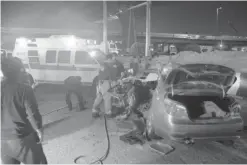  ??  ?? KUWAIT: Shuwaikh firemen responded to the scene of a traffic accident reported yesterday in the area. They freed a Kuwaiti who was trapped in one of the vehicles involved in the accident. The man was taken along with another crash victim, an Asian...