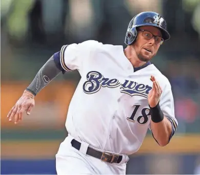  ?? MIKE MCGINNIS / GETTY IMAGES ?? Eric Sogard was a quality acquisitio­n for the Brewers this season, but will he be back?