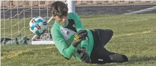  ?? JANE PHILLIPS/FOR THE NEW MEXICAN ?? Santa Fe Prep goalkeeper Xander Huasko had a rough day Saturday. St. Michael’s won 5-0 in the State Soccer Tournament, eliminatin­g the Blue Griffins.