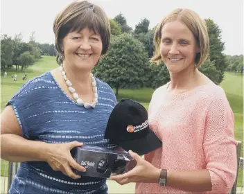  ??  ?? WEST END’S Zoe Hartley (right) is a divisional monthly winner in the Titleist Order Of Merit, HowDidiDo competitio­n.She was presented with a GolfBuddy GPS, Titleist balls and a How-Did-I-Do cap by Lady Captain Joyce Stimpson.