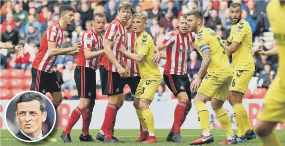  ??  ?? David v Goliath: Fleetwood Town defenders try to suffocate Sunderland’s threat on Saturday. Inset: Sunderland manager Jack Ross.