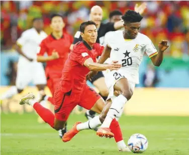  ?? Reuters* ?? Ghana’s Mohammed Kudus in action with South Korea’s Jung Woo-young.