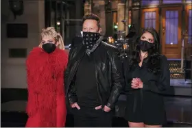  ?? ROSALIND O’CONNOR/NBC VIA AP ?? This image released by NBC shows musical guest Miley Cyrus, from left, host Elon Musk, and Cecily Strong during promos in Studio 8H on May 6.