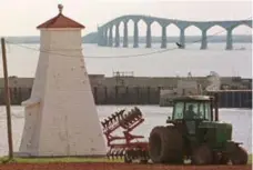  ?? ANDREW VAUGHAN/THE CANADIAN PRESS FILE PHOTO ?? The Confederat­ion Bridge, linking Prince Edward Island to the mainland, is now 18, twice as old as the first version of the Apple iPhone.
