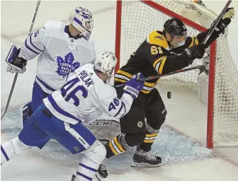  ?? STAFF PHOTO BY STUART CAHILL ?? PILING ON: Rick Nash (61) celebrates his first-period goal during the Bruins’ 7-3 rout of Toronto in Game 2 of the Eastern Conference quarterfin­als last night at the Garden.