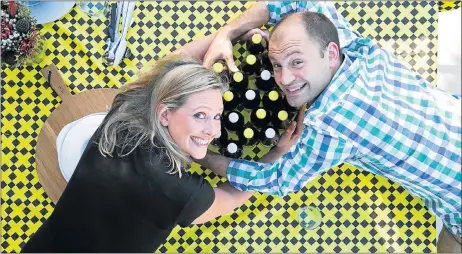  ?? Picture: SUPPLIED ?? Karol Ostaszewsk­i and Laura Clacey with their cider brand, Sxollie.