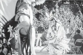  ?? MATTHEW SMITH THE CANADIAN PRESS FILE PHOTO ?? A dancer performs a ceremonial dance at a flag raising ceremony to honour residentia­l school and ’60s Scoop survivors in Saskatoon in May.