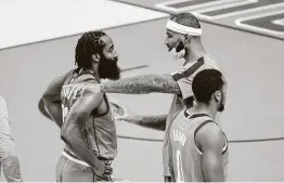  ?? Mark Mulligan / Staff photograph­er ?? James Harden and Demarcus Cousins have an animated conversati­on during Tuesday’s game, with the discontent being voiced publicly on Wednesday.