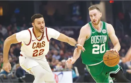  ?? AP-Yonhap ?? Boston Celtics’ Gordon Hayward, right, drives past Cleveland Cavaliers’ Larry Nance Jr., left, in the first half of an NBA basketball game, Tuesday, in Cleveland, Ohio.