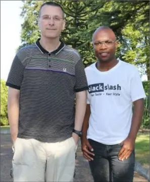  ??  ?? Father Martin Pender with South African student Terence Sabasaba