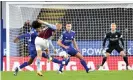  ??  ?? Ross Barkley shoots to score the winner for Aston Villa, past Kasper Schmeichel in the Leicester goal. Photograph: Plumb Images/Leicester City FC/Getty Images