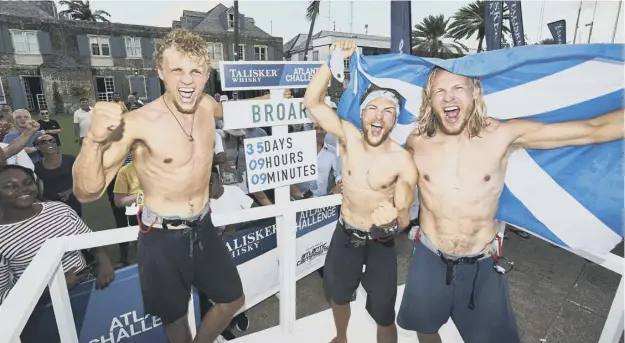  ??  ?? 0 Lachlan, Ewan and Jamie Maclean, from left, celebrate crossing the Atlantic in 35 days breaking the previous benchmark of 41 days