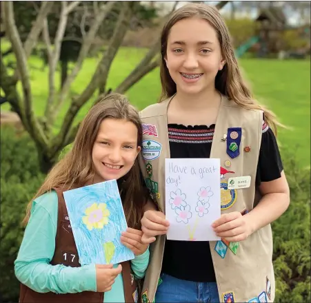  ?? SUBMITTED PHOTO ?? Douglassvi­lle sisters Alexis Darrohn, 8, a Brownie in Troop #1709, and Olivia Darrohn, 13, a Troop #1797Cadett­e, have been writing letters to residents at Keystone Villa Douglassvi­lle who cannot have visitors due to the stay-at-home order.