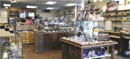  ??  ?? Agates, jaspers, minerals, fossils, rough rock, polished stone, lapidary jewelry, and welcoming staff members await at The Gem Shop, Inc.